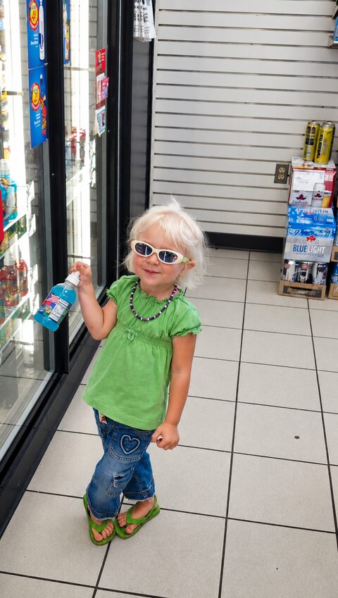 McKinley at age 3, smiling in sunglasses